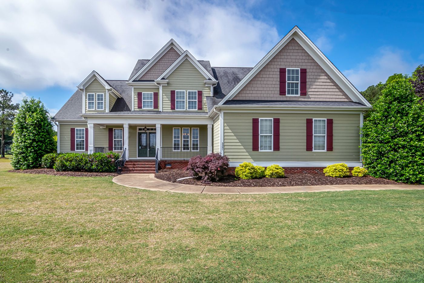 Newly replaced white-framed windows on a suburban American home